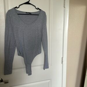 Never worn Grey Body Suit